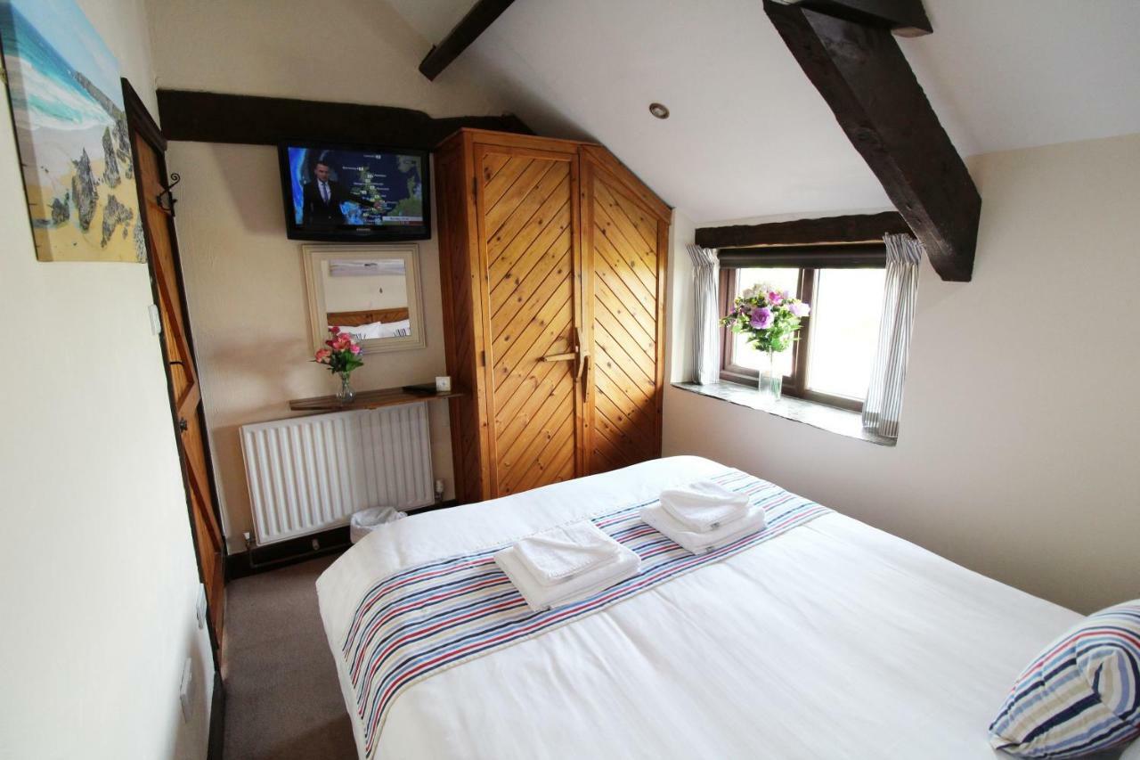 Houndapitt Cottages บู๊ด ภายนอก รูปภาพ