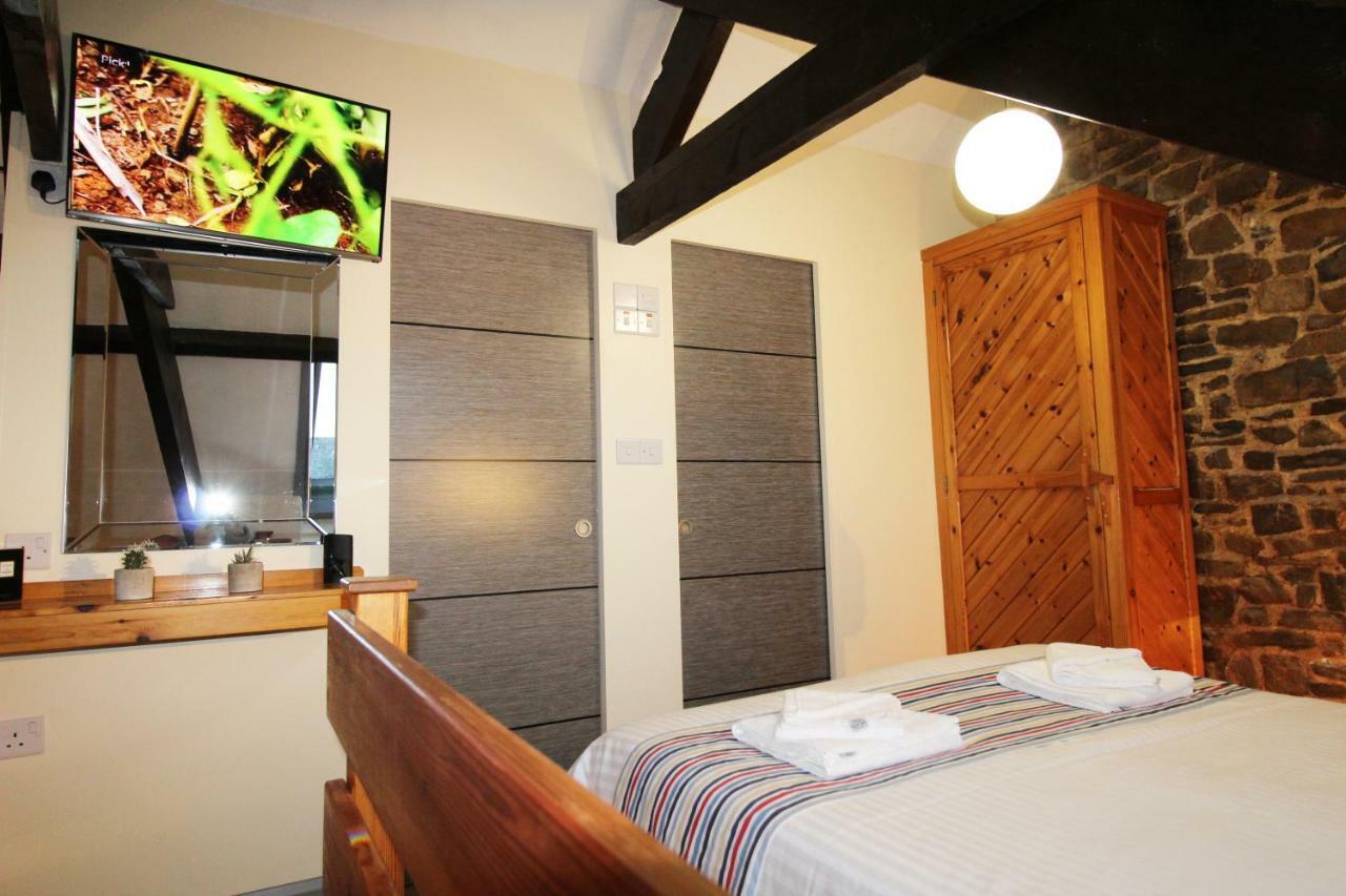 Houndapitt Cottages บู๊ด ภายนอก รูปภาพ